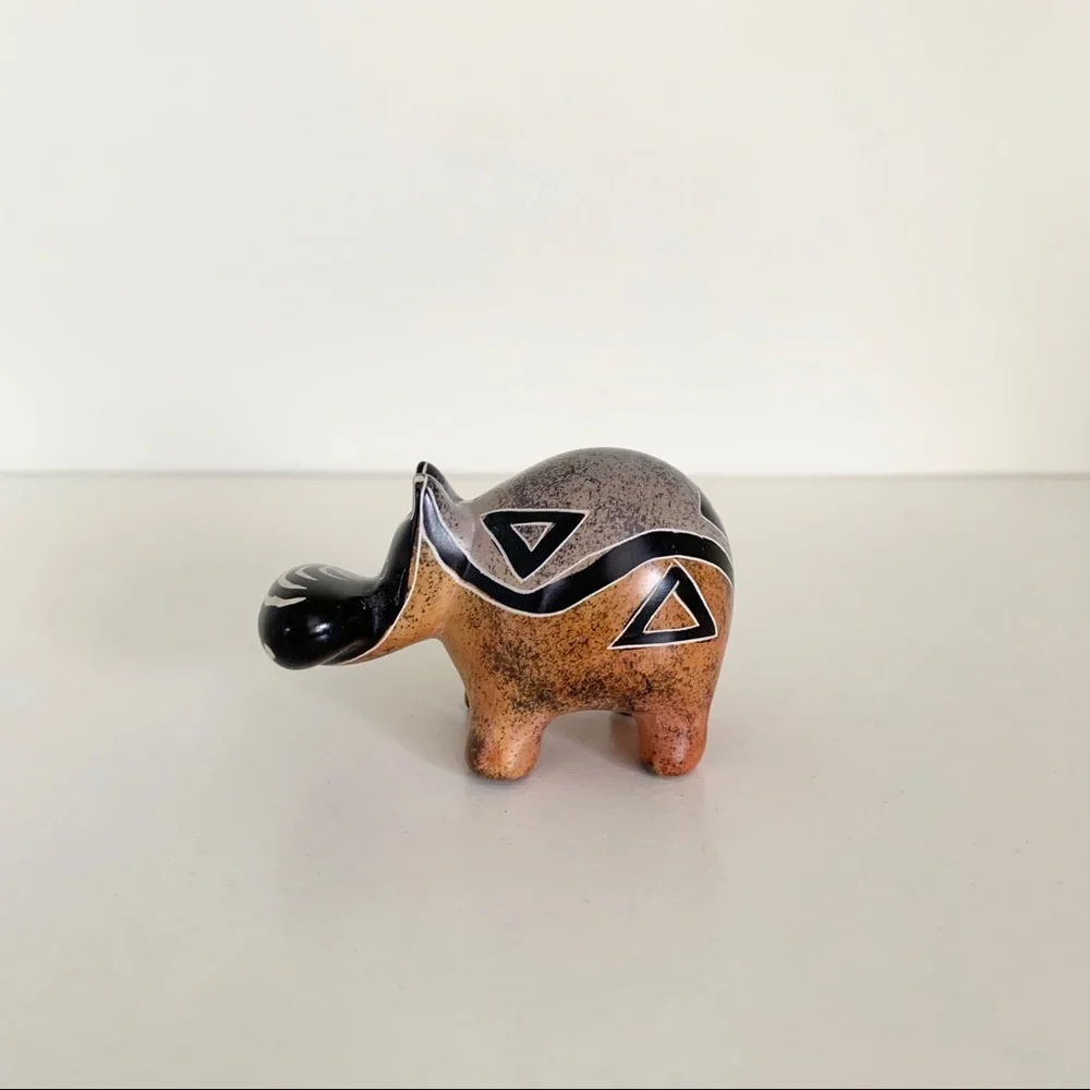 Stone hippo statuette